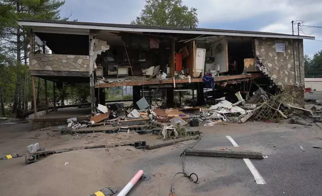 A flood damaged building left by tropical depression Helene is seen in Newport, Tenn., Saturday, Sept. 28, 2024. (AP Photo/George Walker IV)