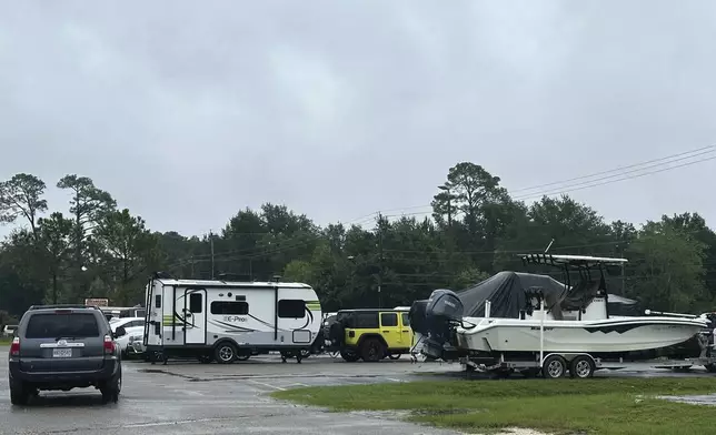 North Street Plaza prepares for Hurricane Francine Wednesday, Sept. 11, 2024 in Pass Christian, Miss. (Hunter Dawkins/The Gazebo Gazette via AP)