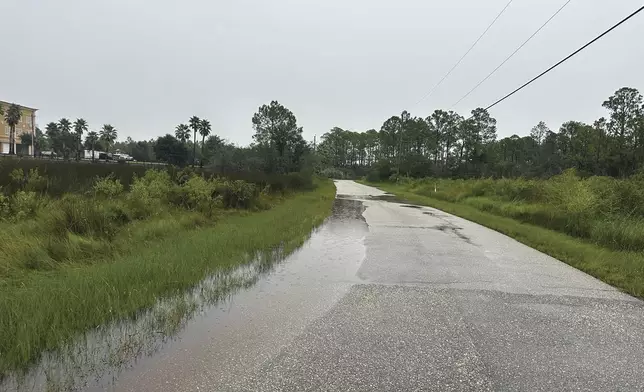 Flood waters begin to build on Clark Avenue in Pass Christian, Miss. before Hurricane Francine Wednesday, Sept. 11, 2024. (Hunter Dawkins/The Gazebo Gazette via AP)