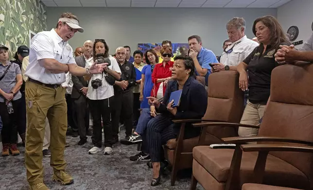 Louisiana Governor Jeff Landry, left, speaks with Mayor of New Orleans LaToya Cantrell during a meeting at New Orleans International Airport, Friday, Sept. 13, 2024, in Kenner, La. (Hilary Scheinuk/The Advocate via AP, Pool)