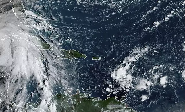 This satellite image provided by NOAA shows Tropical Storm Helene in the Caribbean Sea on Wednesday, Sept. 25, 2024. (NOAA via AP)