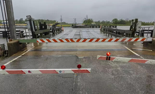 Bridges are closed just miles from the Gulf of Mexico as the effects of Hurricane Francine are felt along the Louisiana coast in Terrebonne Parish on Wednesday, Sept. 11, 2024. (Chris Granger/The Times-Picayune/The New Orleans Advocate via AP)