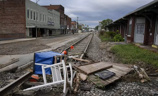 Flood debris left by tropical depression Helene is seen in Newport, Tenn., Saturday, Sept. 28, 2024. (AP Photo/George Walker IV)