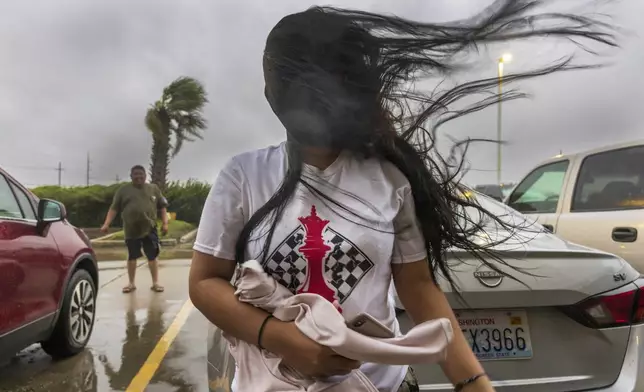 Melanie Galindo's hair flies in the swirl of fast-moving air as the eye wall of Hurricane Francine crosses into the Houma area in Louisiana on Wednesday, September 11, 2024. (Chris Granger, The Times-Picayune via AP)