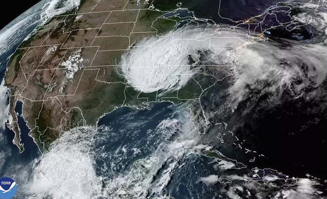 This satellite image from the National Oceanic and Atmospheric Administration taken at 6:11pm ET shows Hurricane Helene, which weakened into a post-tropical cyclone, over the United States on Friday, Sept. 27, 2024. (NOAA via AP)