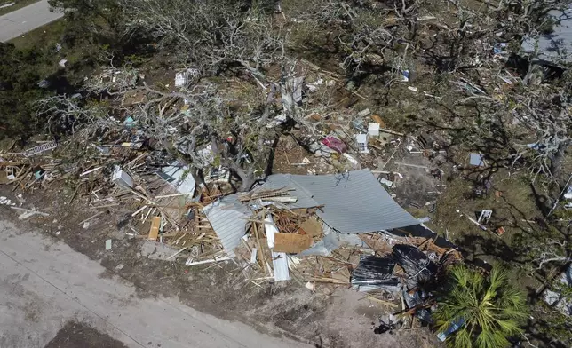 Destruction is seen in the aftermath of Hurricane Helene, in Horseshoe Beach, Fla., Saturday, Sept. 28, 2024. (AP Photo/Stephen Smith)