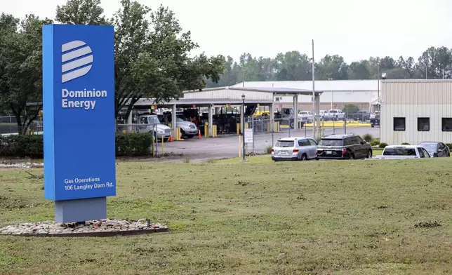 The Dominion Energy sign outside of the Gas Operations center in the aftermath of Hurricane Helene Sunday, Sept. 29, 2024, in Aiken, S.C. (AP Photo/Artie Walker Jr.)