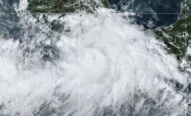 This National Oceanic and Atmospheric Administration satellite image taken at 6:10pm ET shows Hurricane John near southern Mexico on Monday, Sept. 23, 2024. (NOAA via AP)