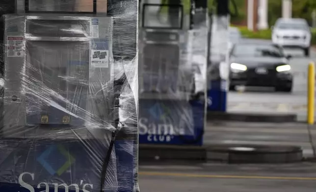 The Sam's Club fuel island is closed ahead of Hurricane Helene, expected to make landfall Thursday evening, Thursday, Sept. 26, 2024, in Valdosta, Ga. (AP Photo/Mike Stewart)