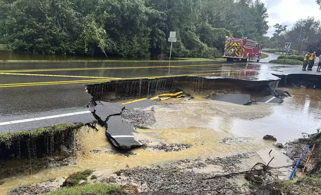 This photo provided by Brunswick County Sheriff's Office shows a flooded highway after a storm dropped historic amounts of rain, Monday, Sept. 16 2024. (Brunswick County Sheriff's Office via AP)