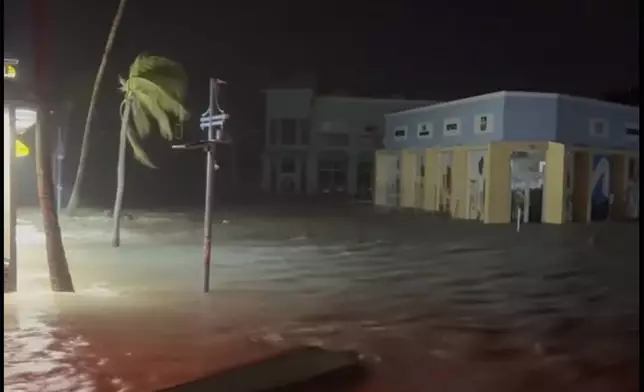 This photo provided by Lee County Sheriff's office shows floodwaters by Hurricane Helene in Fort Myers Beach, Fla., on Thursday, Sept. 26, 2024. (Lee County Sheriff's Office via AP)