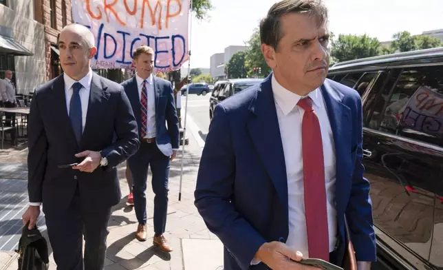 Former President Donald Trump attorneys Emil Bove, left, and Todd Blanche, right, leave the U.S. Federal Courthouse, after a hearing, Thursday, Sep. 5, 2024, in Washington. A judge is hearing arguments about potential next steps in the federal election subversion prosecution of Donald Trump in the first hearing since the Supreme Court narrowed the case by ruling that former presidents are entitled to broad immunity from criminal charges. (AP Photo/Jose Luis Magana)