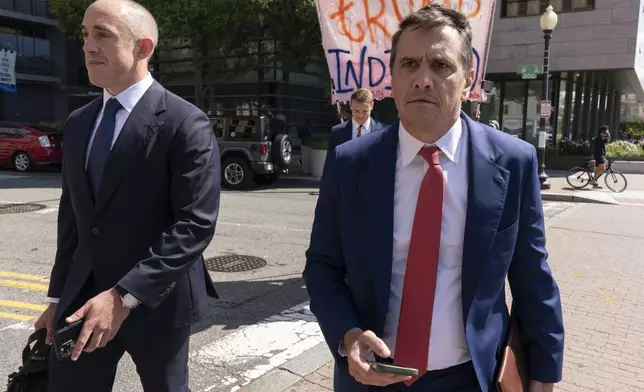 Former President Donald Trump attorneys Emil Bove, left, and Todd Blanche leave the U.S. Federal Courthouse, after a hearing, Thursday, Sep. 5, 2024, in Washington. A judge is hearing arguments about potential next steps in the federal election subversion prosecution of Donald Trump in the first hearing since the Supreme Court narrowed the case by ruling that former presidents are entitled to broad immunity from criminal charges. (AP Photo/Jose Luis Magana)