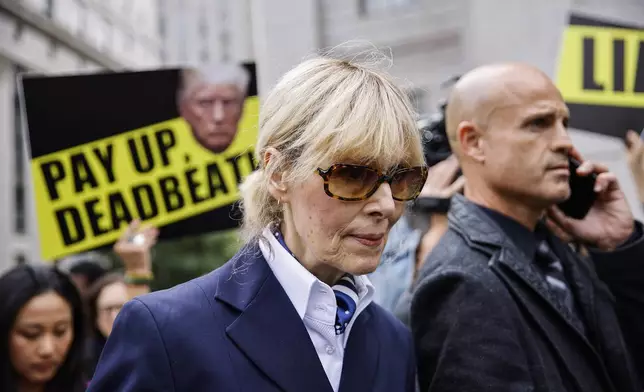 E. Jean Carroll exits the New York Federal Court after former President Donald Trump appeared in court, Friday, Sept. 6, 2024, in New York. (AP Photo/Eduardo Munoz Alvarez)