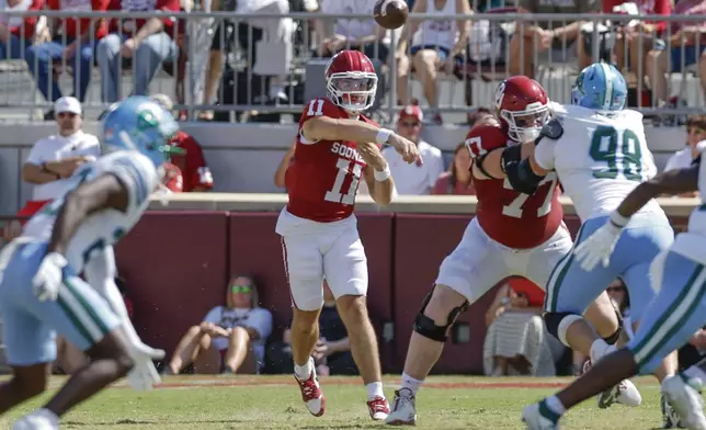 Oklahoma quarterback Jackson Arnold (11) passes against Tulane during the first quarter of an NCAA college football game Saturday, Sept. 14, 2024, in Norman, Okla. (AP Photo/Alonzo Adams)