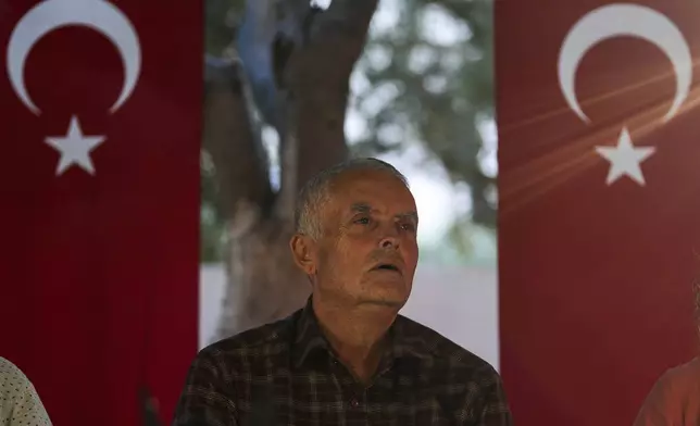 Mehmet, the father of Aysenur Ezgi Eygi, 26 year-old Turkish-American human rights activist from Seattle killed by the Israeli military, speaks to the media outside the family home in Didim, Turkey, Thursday, Sept. 12, 2024. (AP Photo/Khalil Hamra)