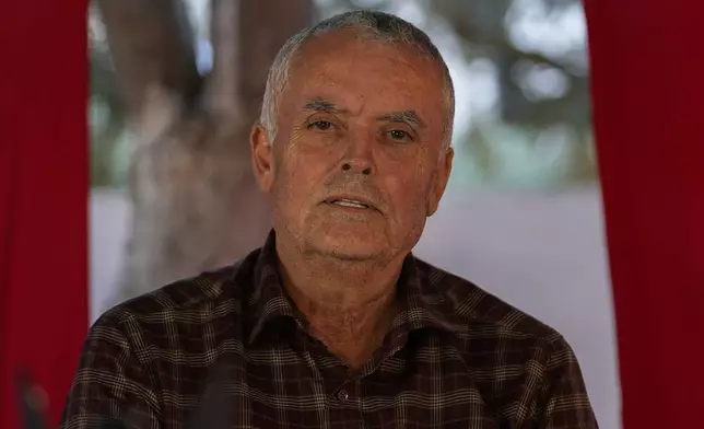 Mehmet, the father of Aysenur Ezgi Eygi, 26 year-old Turkish-American human rights activist from Seattle killed by the Israeli military, speaks to the media outside the family home in Didim, Turkey, Thursday, Sept. 12, 2024. (AP Photo/Khalil Hamra)