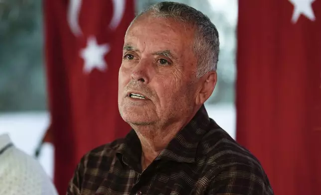 Mehmet, the father of Aysenur Ezgi Eygi, 26 year-old Turkish-American human rights activist from Seattle killed by the Israeli military, speaks to the media outside the family home in Didim, Turkey, Thursday, Sept. 12, 2024. (AP Photo/Khalil Hamra)