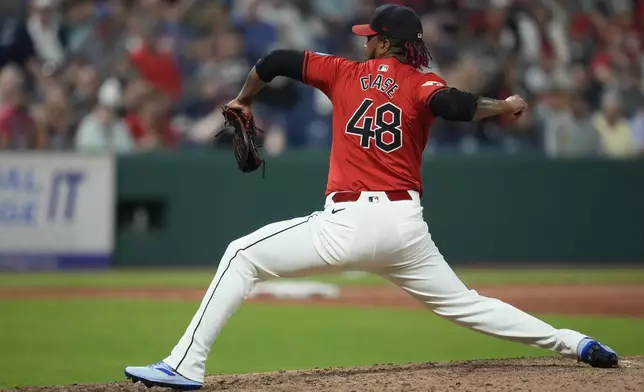 Cleveland Guardians' Emmanuel Clase pitches in the ninth inning of a baseball game against the Minnesota Twins, Monday, Sept. 16, 2024, in Cleveland. (AP Photo/Sue Ogrocki)