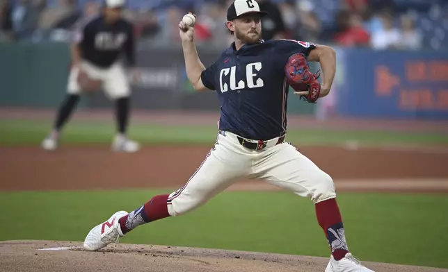 Cleveland Guardians starting pitcher Tanner Bibee (28) delivers during the first inning of a baseball game against the Minnesota Twins, Wednesday, Sept. 18, 2024, in Cleveland. (AP Photo/David Dermer)