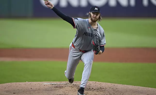 Minnesota Twins starting pitcher Bailey Ober delivers during the first inning of a baseball game against the Cleveland Guardians, Wednesday, Sept. 18, 2024, in Cleveland. (AP Photo/David Dermer)