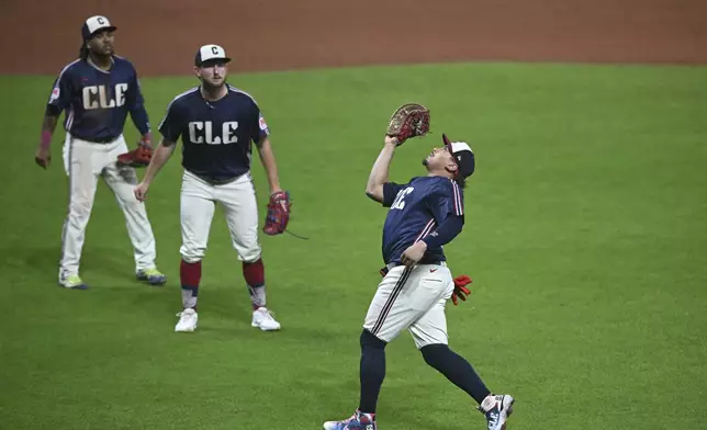 Cleveland Guardians first baseman Josh Naylor catches a fly by hit by Minnesota Twins' Jose Miranda during the sixth inning of a baseball game, Wednesday, Sept. 18, 2024, in Cleveland. (AP Photo/David Dermer)