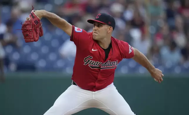 Cleveland Guardians' Matthew Boyd pitches in the first inning of a baseball game against the Minnesota Twins, Monday, Sept. 16, 2024, in Cleveland. (AP Photo/Sue Ogrocki)