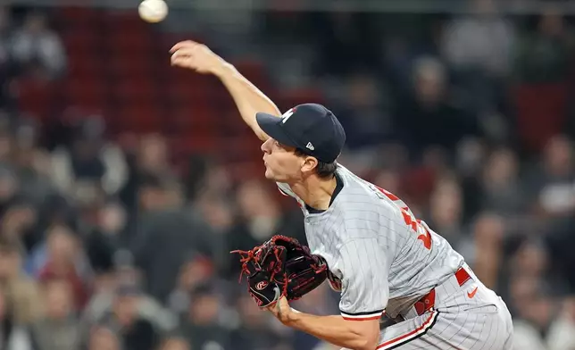 Minnesota Twins starting pitcher David Festa throws against the Boston Red Sox during the first inning of a baseball game, Friday, Sept. 20, 2024, in Boston. (AP Photo/Michael Dwyer)