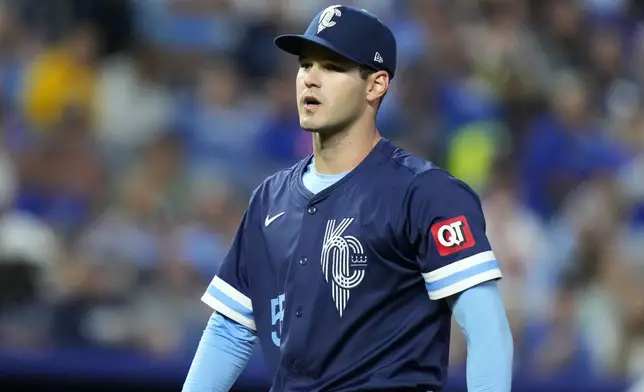 Kansas City Royals starting pitcher Cole Ragans walks to the dugout after the third inning of a baseball game against the Minnesota Twins Friday, Sept. 6, 2024, in Kansas City, Mo. (AP Photo/Charlie Riedel)