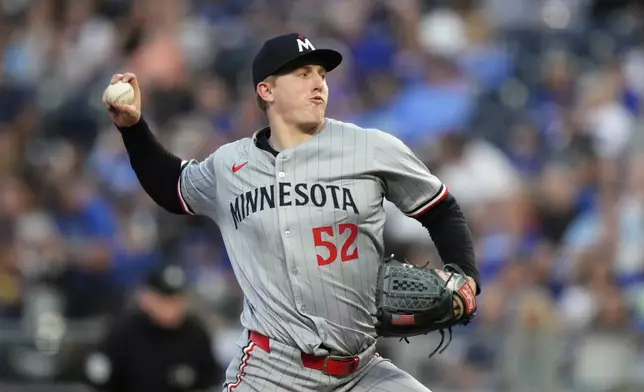 Minnesota Twins starting pitcher Zebby Matthews throws during the first inning of a baseball game against the Kansas City Royals Friday, Sept. 6, 2024, in Kansas City, Mo. (AP Photo/Charlie Riedel)