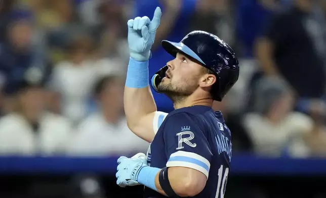 Kansas City Royals' Michael Massey celebrates after hitting a solo home run during the fourth inning of a baseball game against the Minnesota Twins Friday, Sept. 6, 2024, in Kansas City, Mo. (AP Photo/Charlie Riedel)