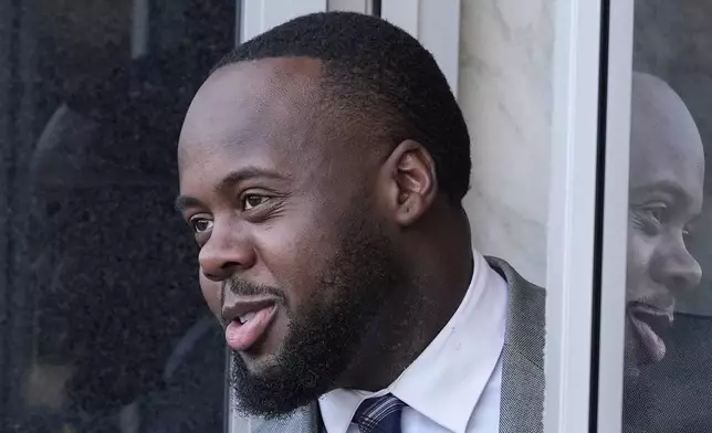 Former Memphis police officer Tadarrius Bean arrives at the federal courthouse for the second day of jury selection for the trial in the Tyre Nichols case Tuesday, Sept. 10, 2024, in Memphis, Tenn. (AP Photo/George Walker IV)