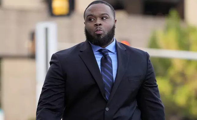 Former Memphis police officer Demetrius Haley arrives at the federal courthouse for the second day of jury selection for the trial in the Tyre Nichols case Tuesday, Sept. 10, 2024, in Memphis, Tenn. (AP Photo/George Walker IV)