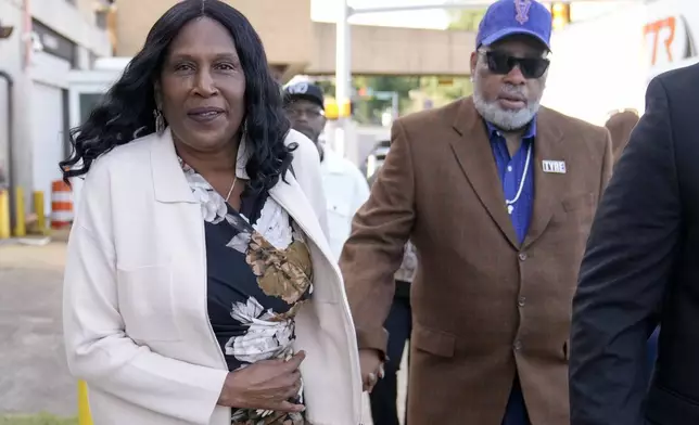 RowVaughn Wells, left, and Rodney Wells, parents of Tyre Nichols, arrive at the federal courthouse before the start of jury selection of the trial in the Tyre Nichols case Monday, Sept. 9, 2024, in Memphis. (AP Photo/George Walker IV)