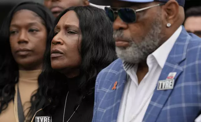 RowVaughn Wells, center, mother of Tyre Nichols, listens during a news conference outside the federal courthouse during the trial of three former Memphis police officers accused of killing her son Wednesday, Sept. 25, 2024, in Memphis, Tenn. (AP Photo/George Walker IV)