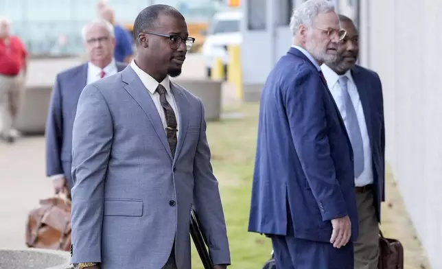 Former Memphis police officer Justin Smith arrives at the federal courthouse before the start of jury selection of the trial in the Tyre Nichols case Monday, Sept. 9, 2024, in Memphis. (AP Photo/George Walker IV)