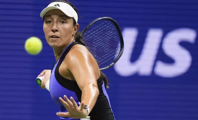 Jessica Pegula, of the United States, returns a shot to Karolina Muchova, of the Czech Republic, during the women's singles semifinals of the U.S. Open tennis championships, Thursday, Sept. 5, 2024, in New York. (AP Photo/Julia Nikhinson)