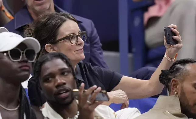 Tina Fey watches the women's singles final of the U.S. Open tennis championships between Aryna Sabalenka, of Belarus, and Jessica Pegula, of the United States, Saturday, Sept. 7, 2024, in New York. (AP Photo/Frank Franklin II)