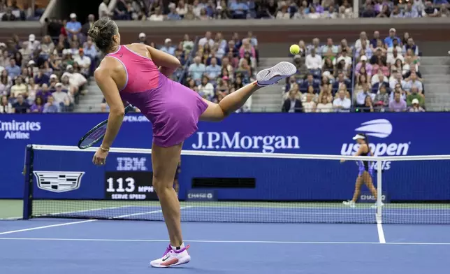 Aryna Sabalenka, of Belarus, kicks the ball after double faulting Jessica Pegula, of the United States, during the women's singles final of the U.S. Open tennis championships, Saturday, Sept. 7, 2024, in New York. (AP Photo/Seth Wenig)