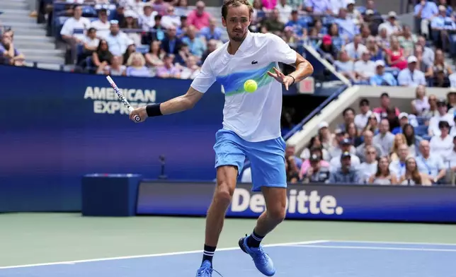 Daniil Medvedev, of Russia, returns a shot during a match against Nuno Borges, of Portugal, in the fourth round of the U.S. Open tennis championships, Monday, Sept. 2, 2024, in New York. (AP Photo/Kirsty Wigglesworth)