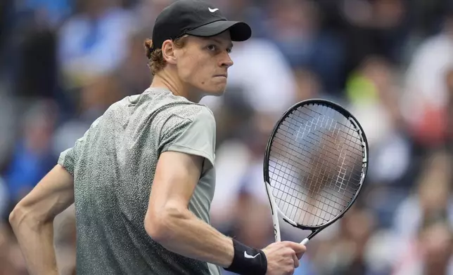 Jannik Sinner, of Italy, reacts after winning a game against Taylor Fritz, of the United States, during the men's singles final of the U.S. Open tennis championships, Sunday, Sept. 8, in New York. 2024. (AP Photo/Seth Wenig)