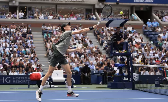 Jannik Sinner, of Italy, returns a shot to Christopher O'Connell, of Australia, during the third round of the U.S. Open tennis championships, Saturday, Aug. 31, 2024, in New York. (AP Photo/Julia Nikhinson)