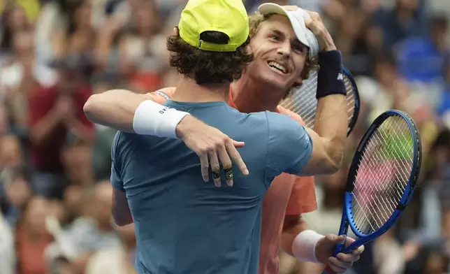 Max Purcell, right, and Jordan Thompson, of Australia, react after defeating Tim Puetz and Kevin Krawietz, of Germany in the men's doubles final of the U.S. Open tennis championships, Saturday, Sept. 7, 2024, in New York. (AP Photo/Pamela Smith)