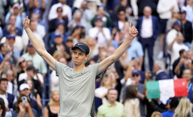 Jannik Sinner, of Italy, reacts after defeating Taylor Fritz, of the United States, to win the men's singles final of the U.S. Open tennis championships, Sunday, Sept. 8, 2024, in New York. (AP Photo/Kirsty Wigglesworth)