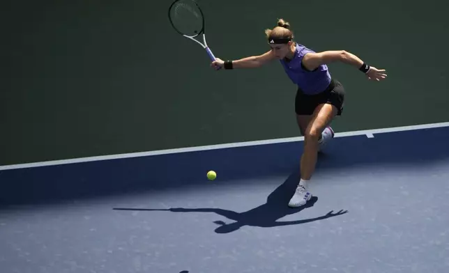 Karolina Muchova, of the Czech Republic, returns a shot to Beatriz Haddad Maia, of Brazil, during the quarterfinals of the U.S. Open tennis championships, Wednesday, Sept. 4, 2024, in New York. (AP Photo/Pamela Smith)