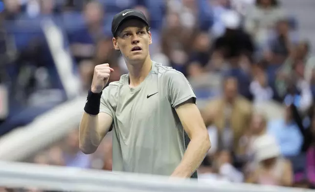 Jannik Sinner, of Italy, reacts after breaking the serve of Jack Draper, of Great Britain, during the men's singles semifinals of the U.S. Open tennis championships, Friday, Sept. 6, 2024, in New York. (AP Photo/Kirsty Wigglesworth)