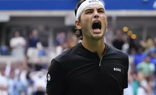 Taylor Fritz, of the United States, reacts in the third set against Jannik Sinner, of Italy, during the men's singles final of the U.S. Open tennis championships, Sunday, Sept. 8, 2024, in New York. (AP Photo/Kirsty Wigglesworth)