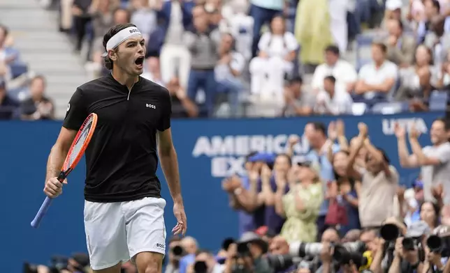 Taylor Fritz, of the United States, reacts in the third set against Jannik Sinner, of Italy, during the men's singles final of the U.S. Open tennis championships, Sunday, Sept. 8, 2024, in New York. (AP Photo/Julia Nikhinson)