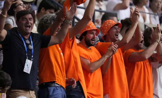 Fans cheer during the men's singles semifinals between Jannik Sinner, of Italy, and Jack Draper, of Great Britain, of the U.S. Open tennis championships, Friday, Sept. 6, 2024, in New York. (AP Photo/Seth Wenig)