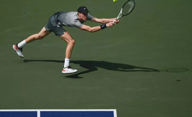 Jannik Sinner, of Italy, returns a shot to Christopher O'Connell, of Australia, during the third round of the U.S. Open tennis championships, Saturday, Aug. 31, 2024, in New York. (AP Photo/Julia Nikhinson)